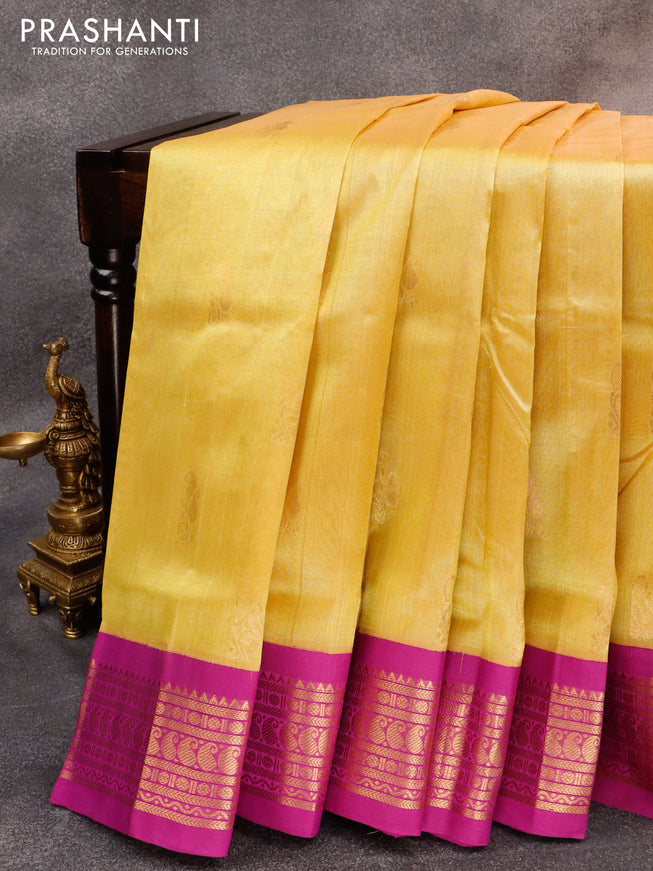 Silk cotton saree yellow and purple with zari woven buttas and zari woven korvai border