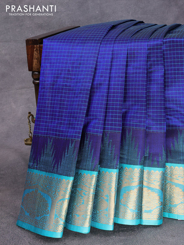 Kuppadam silk cotton saree blue shade and dual shade of teal blue with allover thread check pattern and temple design zari woven annam border
