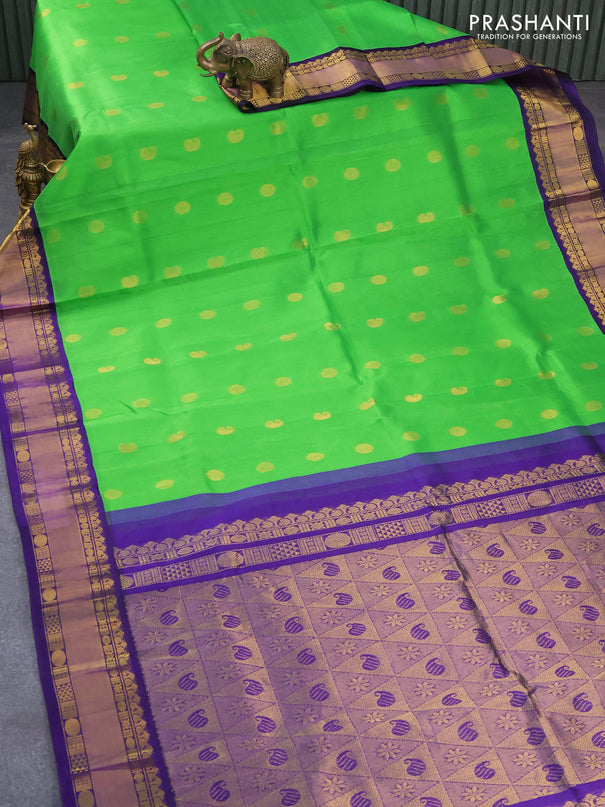 Kuppadam silk cotton saree green and blue with zari woven buttas and rich zari woven border