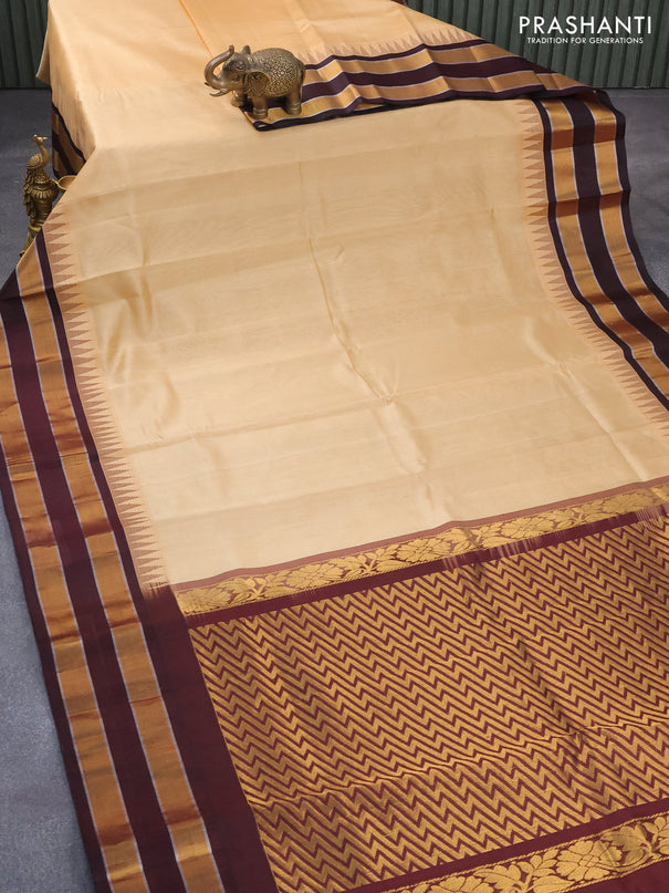 Kuppadam silk cotton saree sandal and coffee brown with plain body and long temple design zari woven border