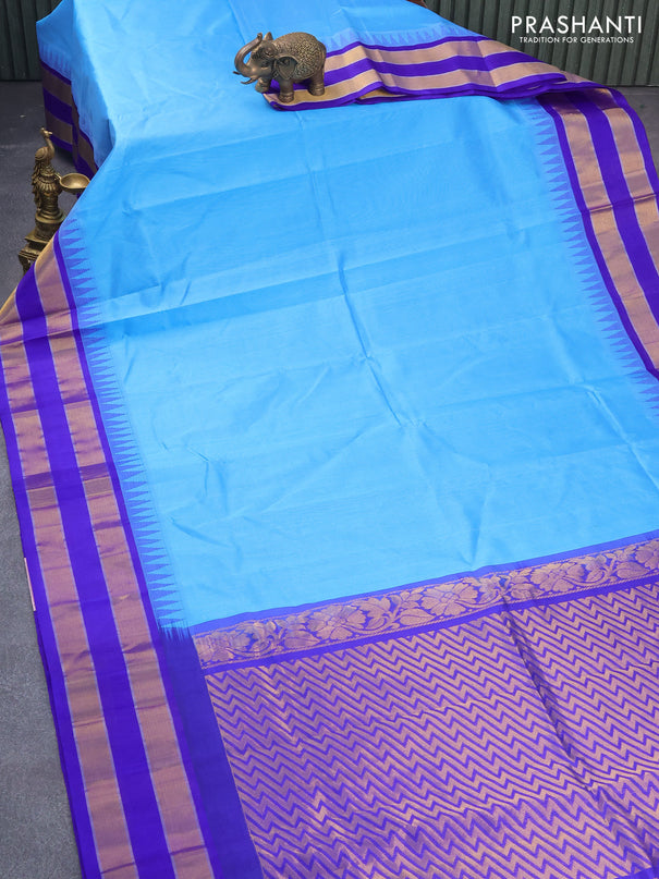 Kuppadam silk cotton saree blue shade and royal blue with plain body and long temple design zari woven border