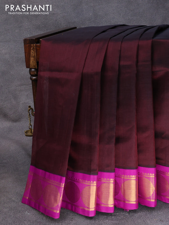 Kuppadam silk cotton saree deep maroon and purple with plain body and rudhraksha zari woven korvai border