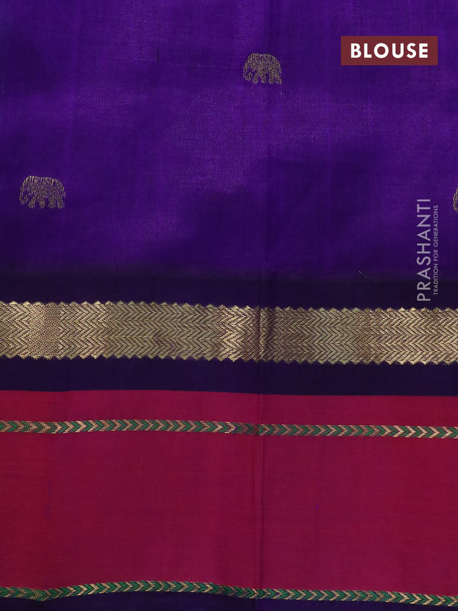 Silk cotton saree teal blue and violet with plain body and zari woven butta korvai border