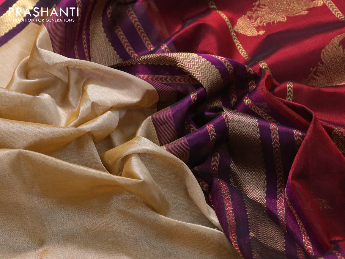 Silk cotton saree sandal and dark purple with plain body and zari woven butta korvai border
