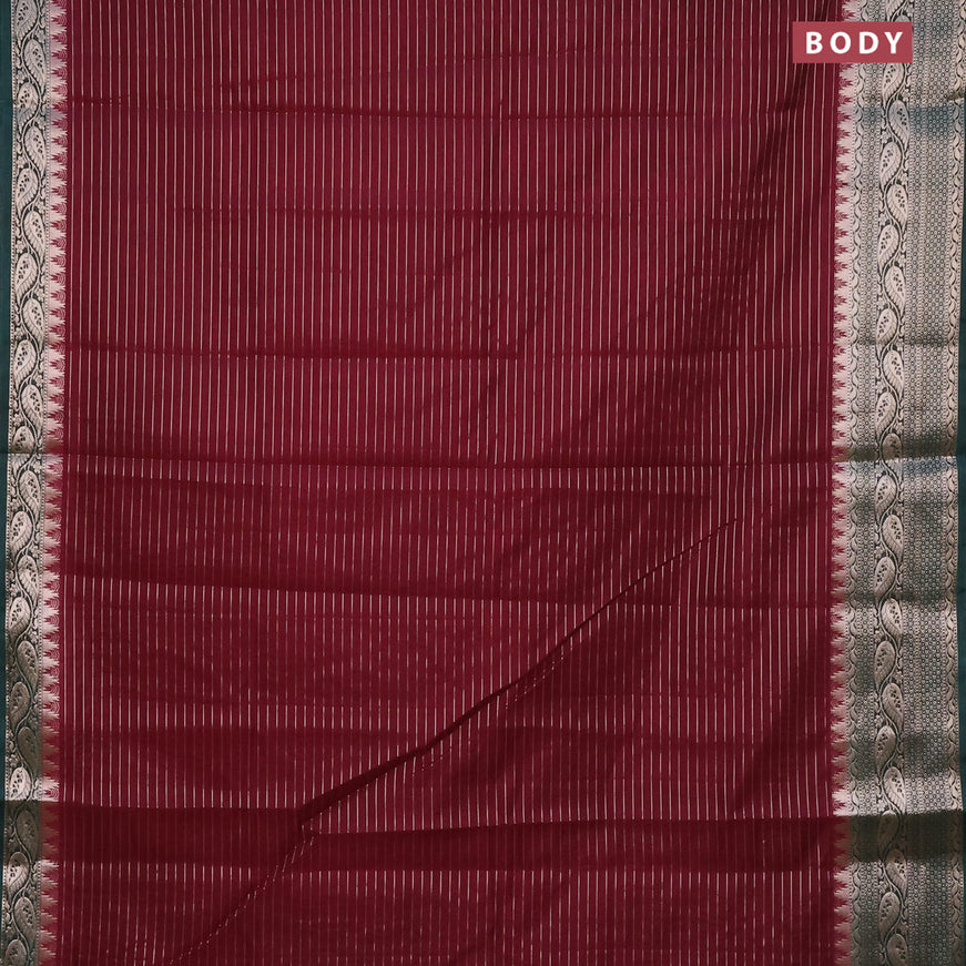 Semi dupion saree dark maroon and dark green with allover zari stripes pattern and zari woven border & meenakari blouse
