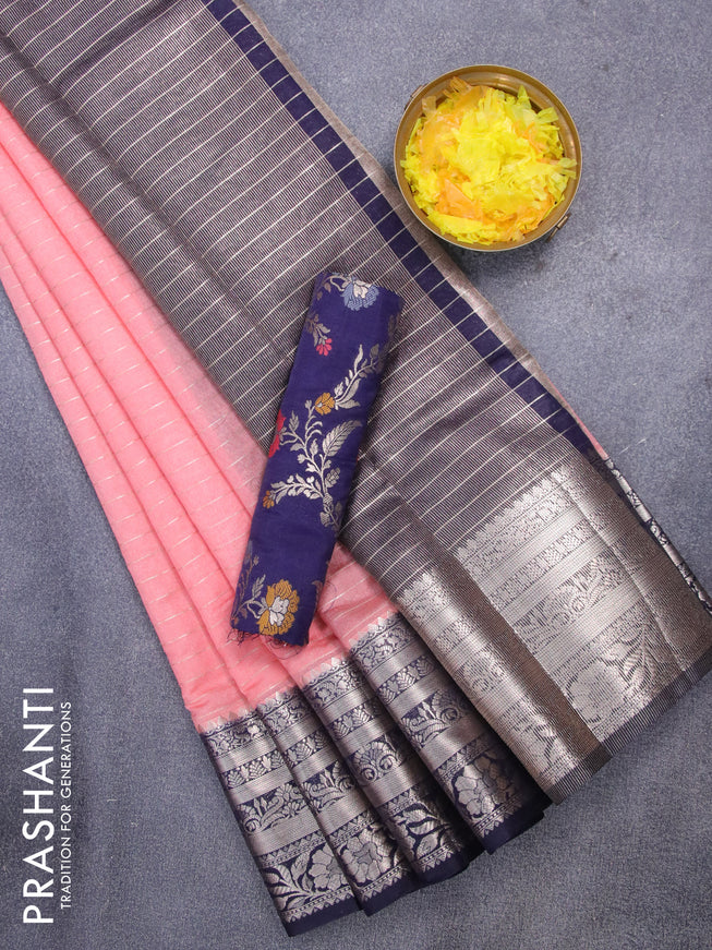 Semi dupion saree peach shade and dark navy blue with allover zari stripes pattern and long zari woven border & meenakari blouse