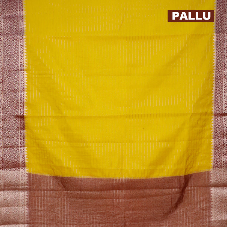 Semi dupion saree yellow and dark maroon with allover zari stripes pattern and zari woven border & meenakari blouse