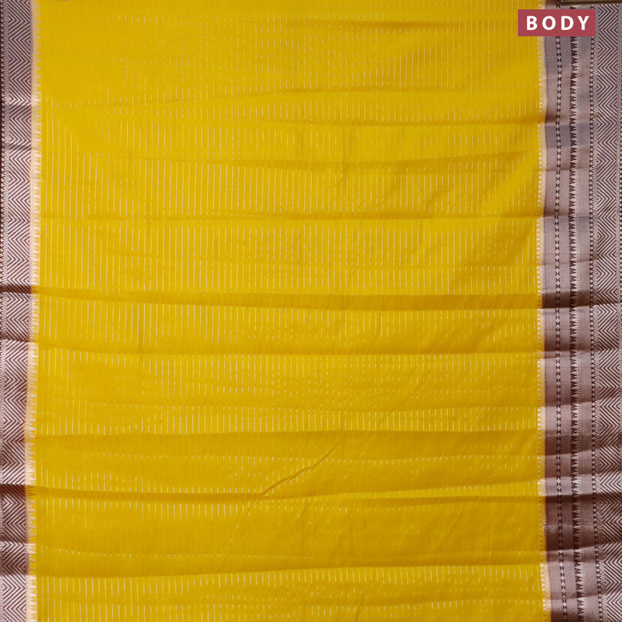 Semi dupion saree yellow and coffee brown with allover zari stripes pattern and long zari woven border & meenakari blouse