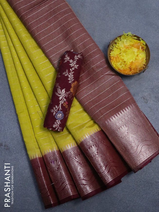 Semi dupion saree lime green and deep maroon with allover zari stripes pattern and zari woven border & meenakari blouse