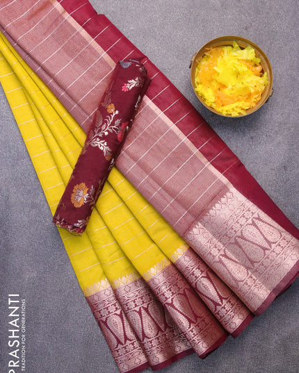 Semi dupion saree lime yellow and deep maroon with allover zari stripes pattern and zari woven border & meenakari blouse