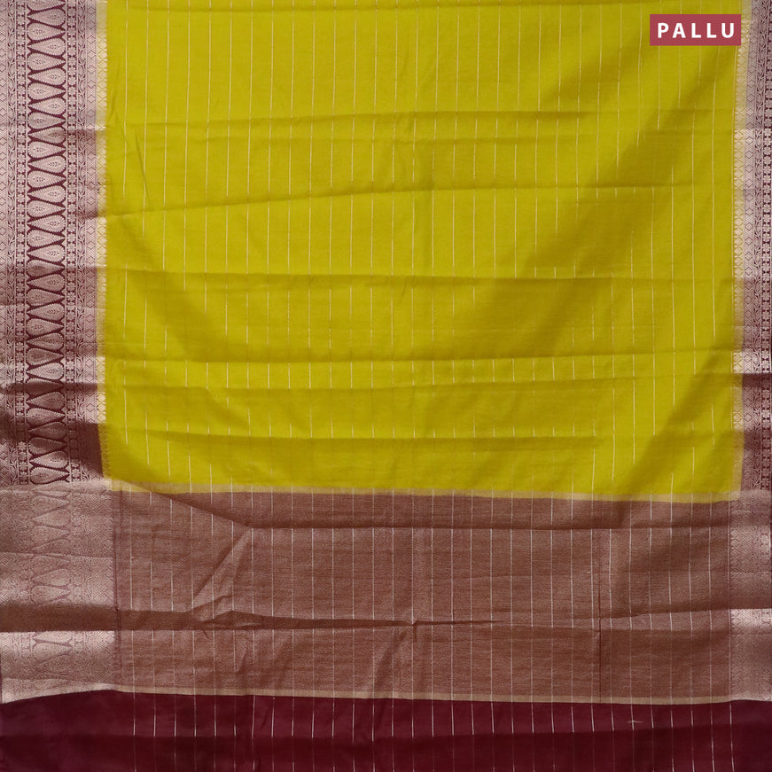 Semi dupion saree lime yellow and deep maroon with allover zari stripes pattern and zari woven border & meenakari blouse