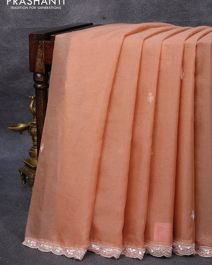 Organza silk saree pastel peach and peach shade with sequin work buttas and zardosi work border & embroidery work readymade blouse
