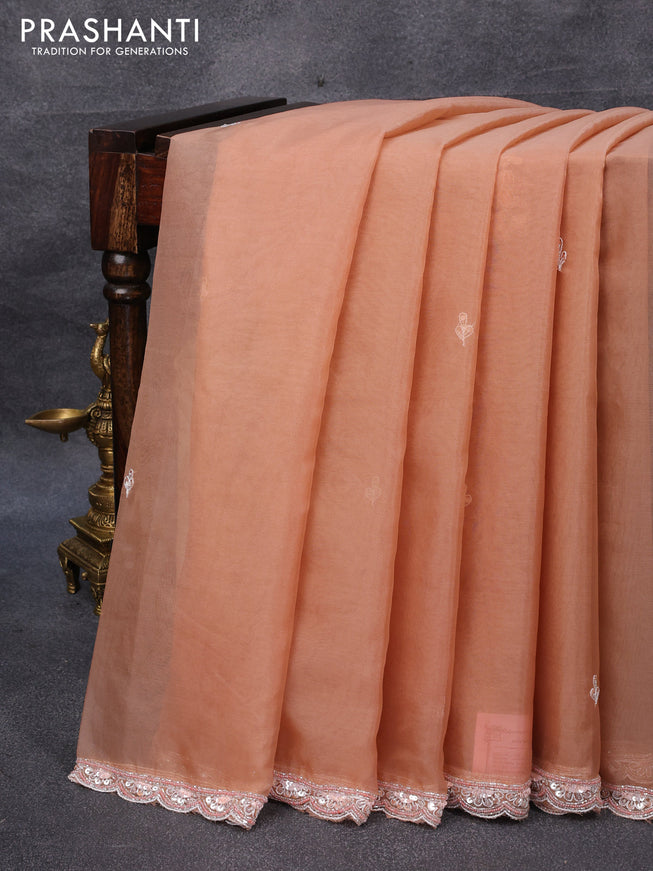 Organza silk saree pastel peach and peach shade with sequin work buttas and zardosi work border & embroidery work readymade blouse