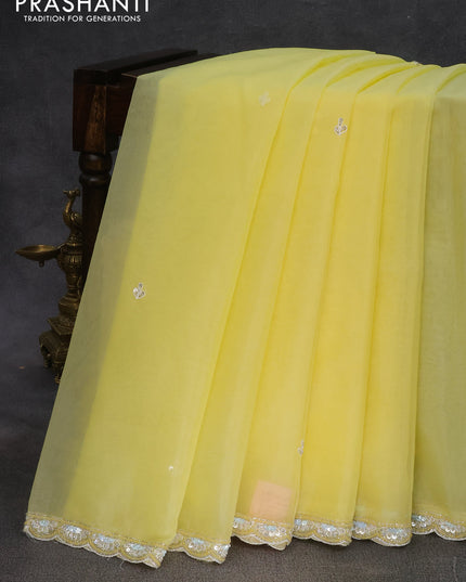 Organza silk saree pale yellow and yellow with sequin work buttas and zardosi work border & embroidery work readymade blouse