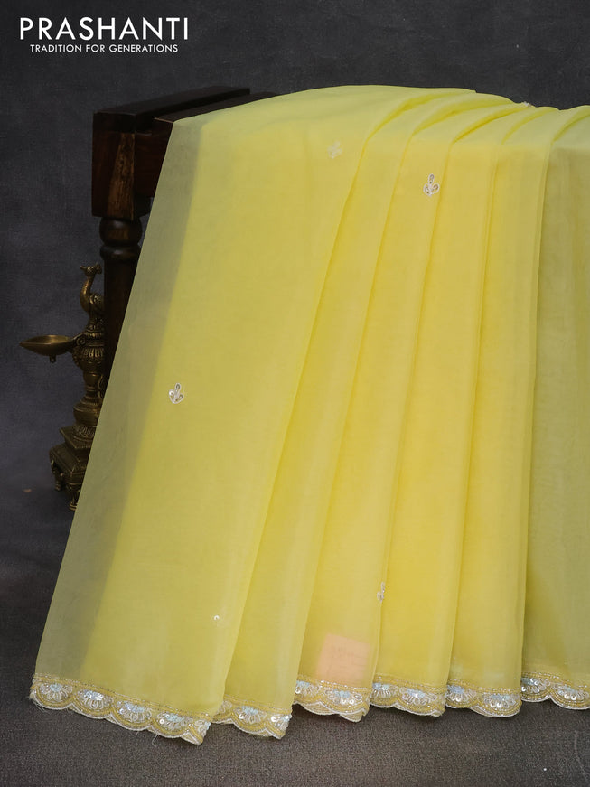 Organza silk saree pale yellow and yellow with sequin work buttas and zardosi work border & embroidery work readymade blouse