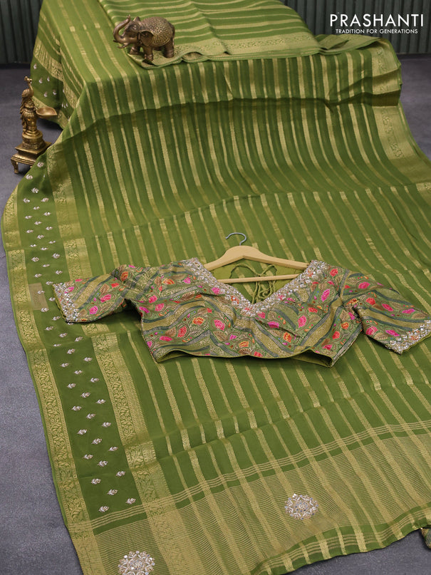 Organza silk saree green with allover zari stripes pattern and embroidery work butta border & embroidery work readymade blouse