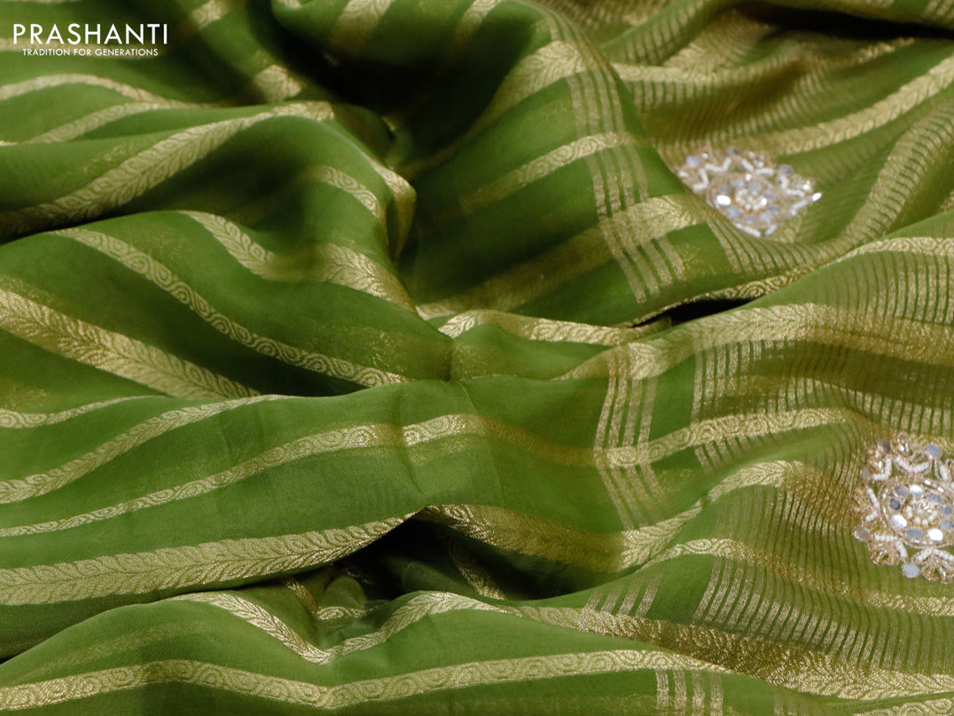 Organza silk saree green with allover zari stripes pattern and embroidery work butta border & embroidery work readymade blouse