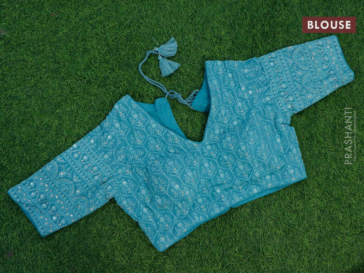 Organza silk saree light blue with allover zari woven stripes pattern and zari woven border & embroidery work readymade blouse