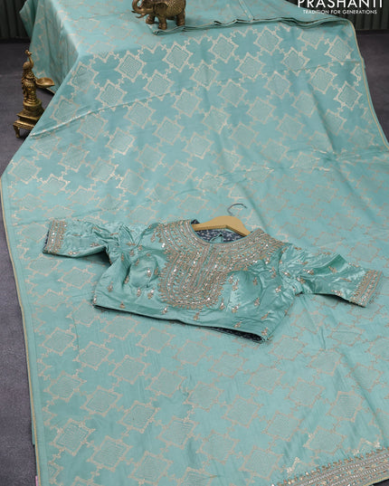 Tussar silk saree pastel green with allover zari woven geometric weaves and lace work border & embroidery work readymade blouse