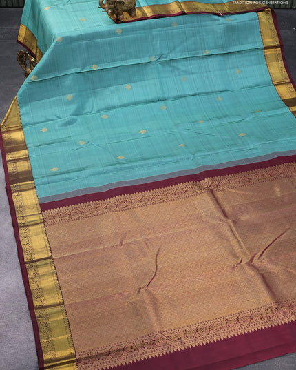Pure kanjivaram silk saree pastel blue and dark maroon with zari woven buttas and zari woven border & butta style