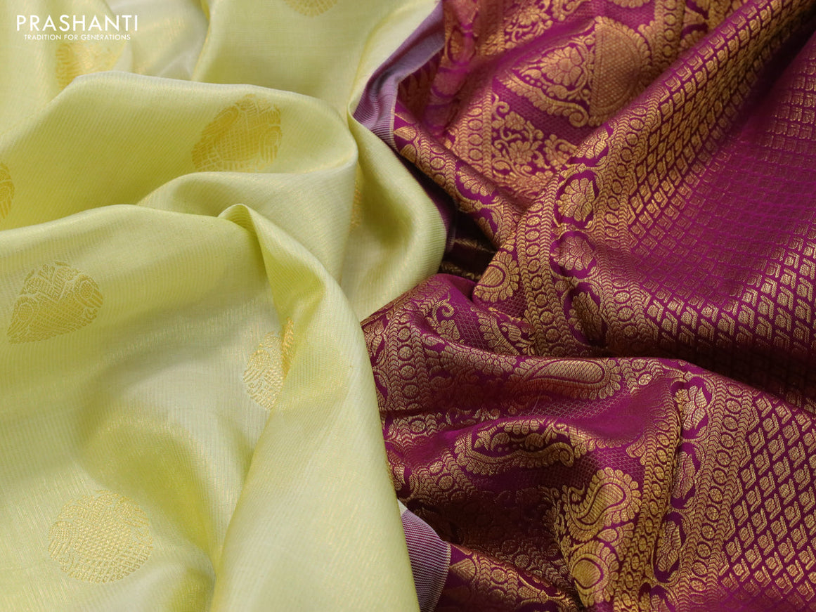 Pure kanjivaram tissue silk saree pale yellow and deep purple with zari woven buttas and long zari woven annam border & tissue