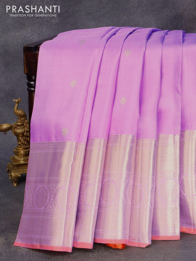 Pure kanjivaram silk saree lavender shade and dual shade of pinkish orange with zari woven floral buttas and long zari woven border & butta style
