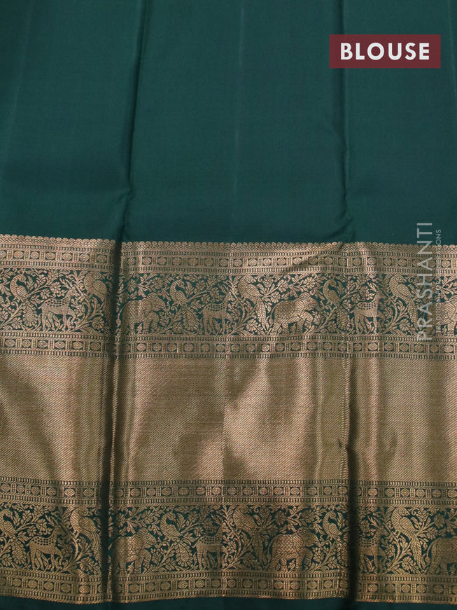 Pure kanjivaram silk saree dark green with zari woven paisley buttas and long zari woven border & butta style