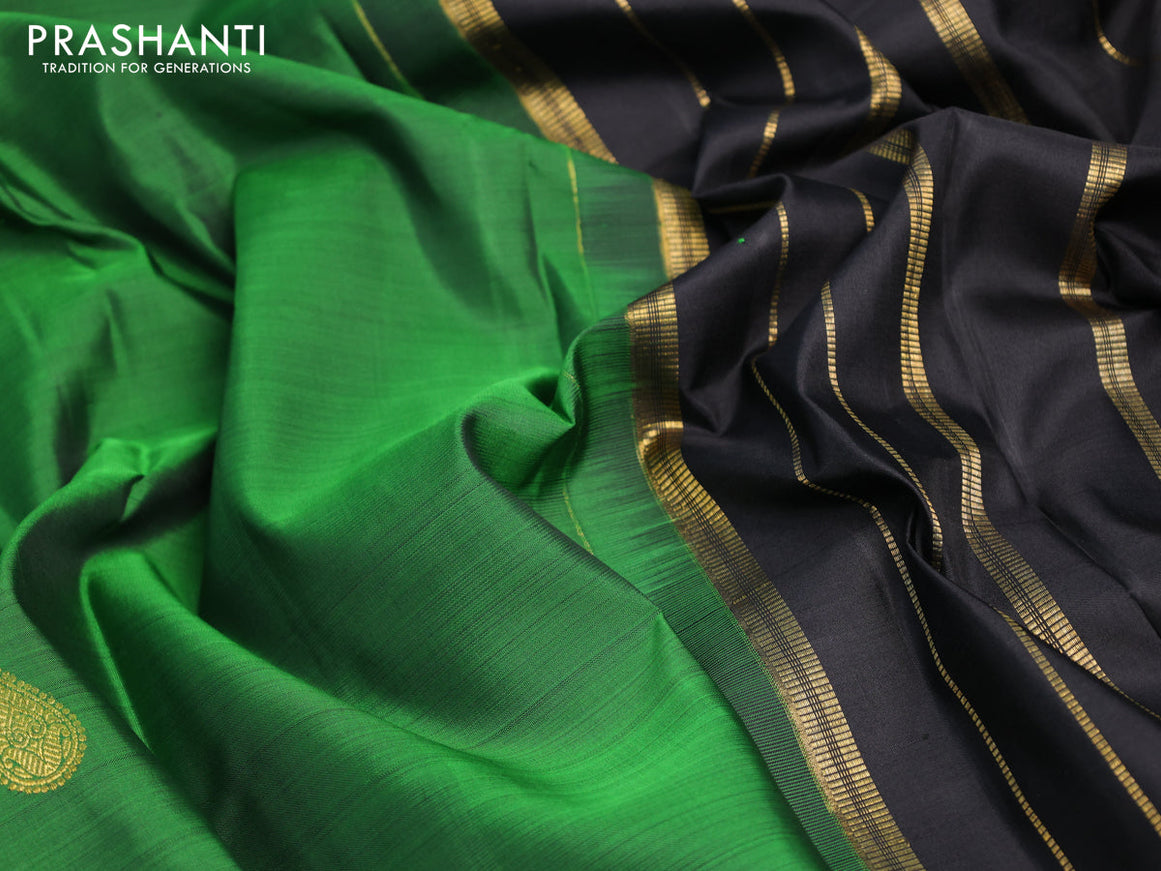 Pure kanjivaram silk saree green and black with zari woven buttas and zari woven border & butta style