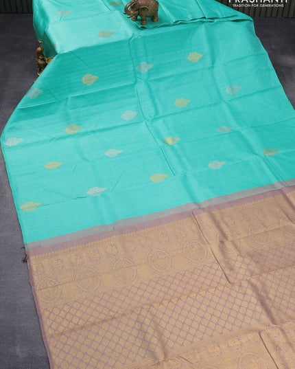 Pure kanjivaram silk saree teal blue and pastel brown with allover silver & gold zari weaves in borderless style & borderless style
