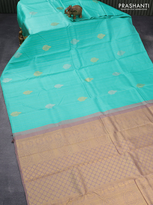 Pure kanjivaram silk saree teal blue and pastel brown with allover silver & gold zari weaves in borderless style & borderless style