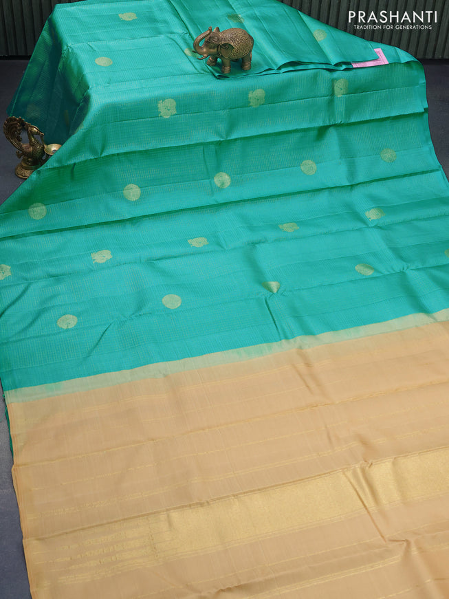 Pure kanjivaram silk saree teal blue and sandal with allover zari checks & annam buttas in borderless style & borderless style