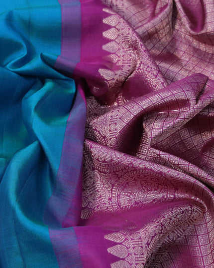 Pure kanjivaram silk saree teal blue and deep purple with silver zari woven buttas in borderless style & borderless style