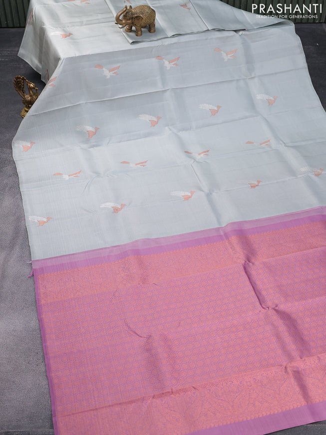 Pure kanjivaram silk saree pastel grey and mild purple with copper & silver zari woven bird buttas in borderless style & borderless style