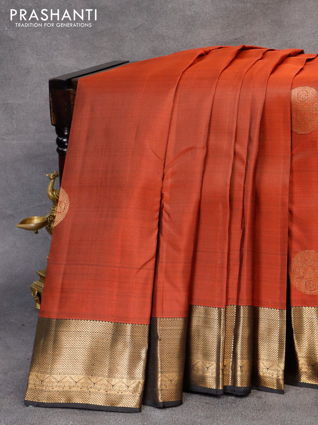 Pure kanjivaram silk saree rustic orange and black with zari woven buttas and zari woven border & butta style