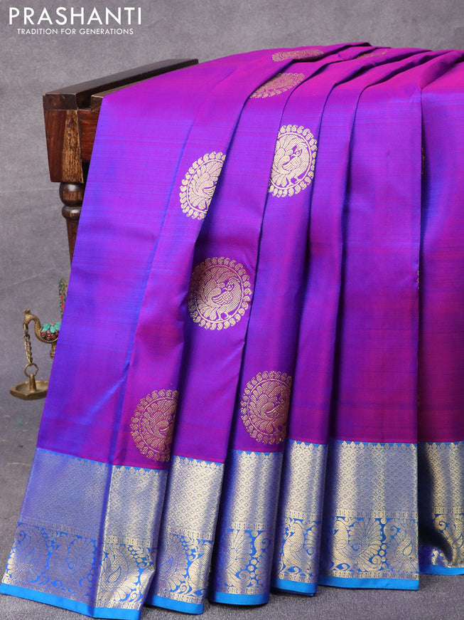 Pure kanjivaram silk saree dual shade of purple and cs blue with annam zari woven buttas and annam zari woven border & butta style