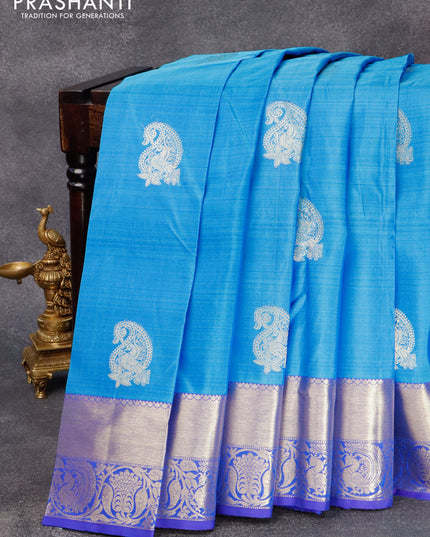 Pure kanjivaram silk saree cs blue and blue with zari woven buttas and zari woven border & butta style