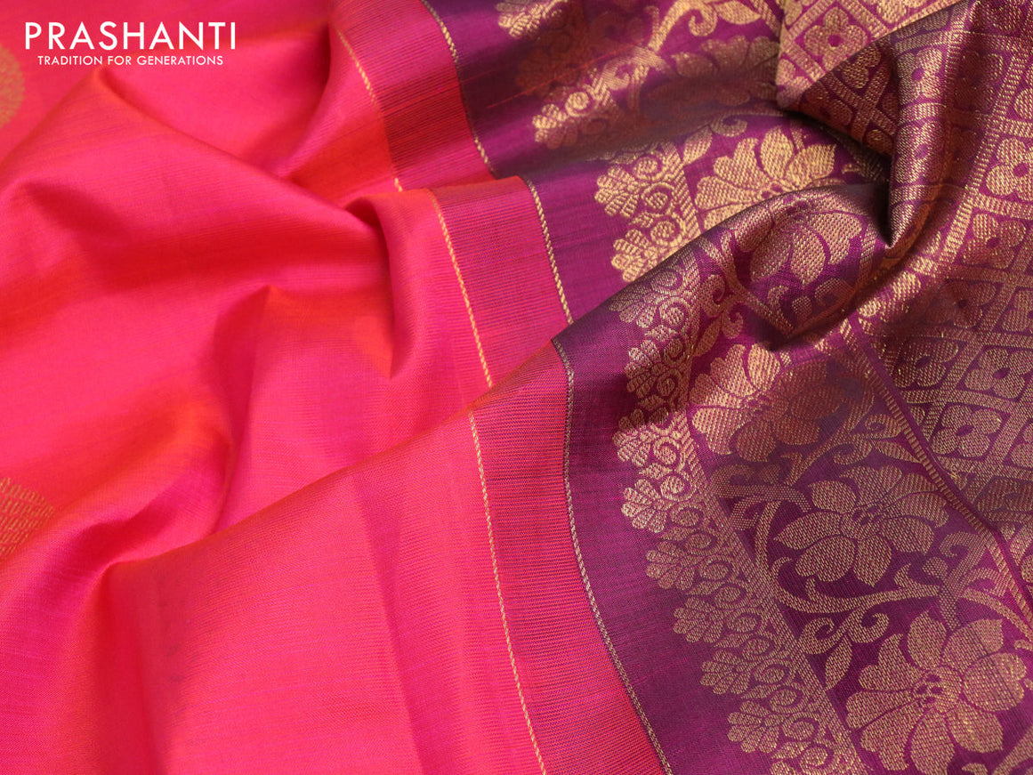 Pure kanjivaram silk saree dual shade of pinkish orange and deep purple with zari woven buttas and zari woven border & butta style