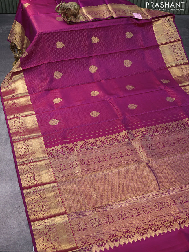 Pure kanjivaram silk saree dual shade of purple with allover zari weaves and zari woven border & butta style