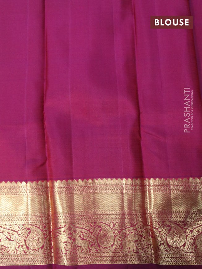 Pure kanjivaram silk saree dual shade of purple with allover zari weaves and zari woven border & butta style