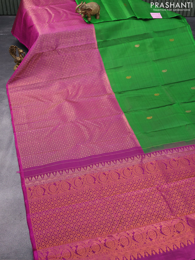 Pure kanjivaram silk saree green and magenta pink with half & half style and long zari woven border & half & half style
