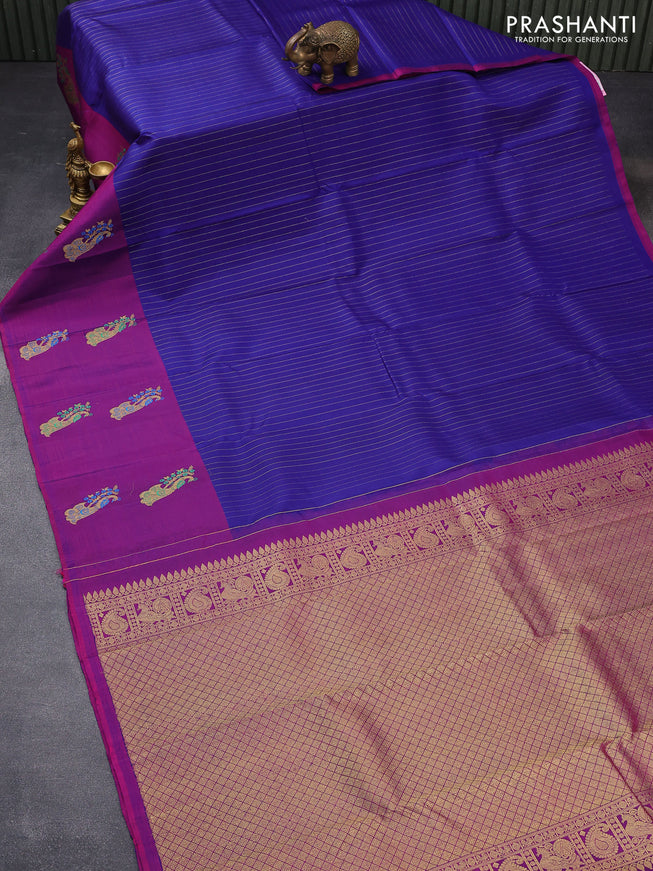 Pure kanjivaram silk saree blue and dual shade of purple with allover zari woven stripes pattern and peacock zari woven butta border & allover weaves
