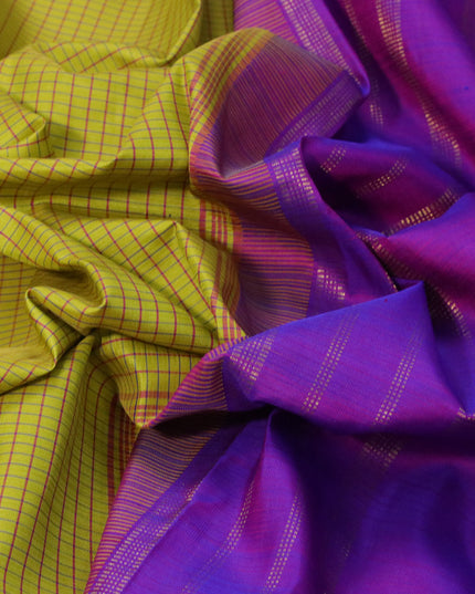 Pure kanjivaram silk saree lime yellow and dual shade of purple with allover checkes pattern and temple design rettapet zari woven border & checkes