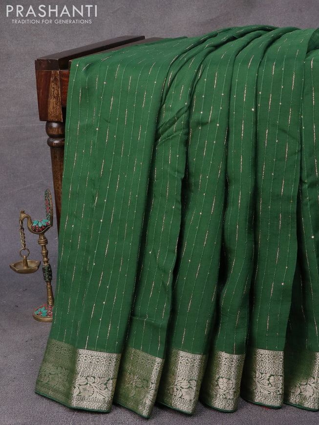 Chinon silk saree green with allover sequin work and zari woven floral border & zari butta blouse