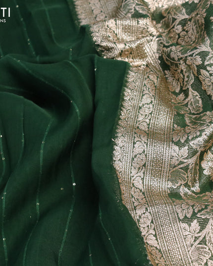Chinon silk saree green with allover sequin work and zari woven floral border & zari butta blouse