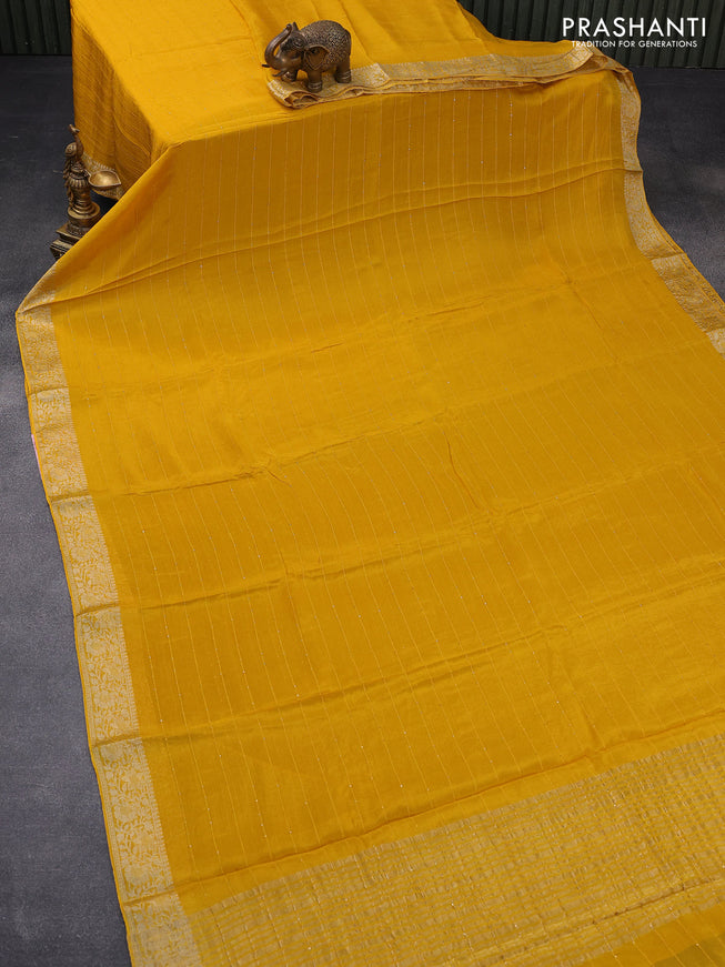 Chinon silk saree yellow with allover sequin work and zari woven floral border & zari butta blouse