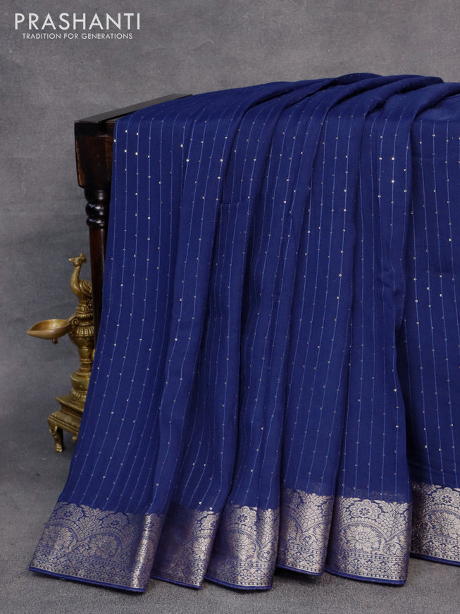 Chinon silk saree blue with allover sequin work and zari woven floral border & zari butta blouse