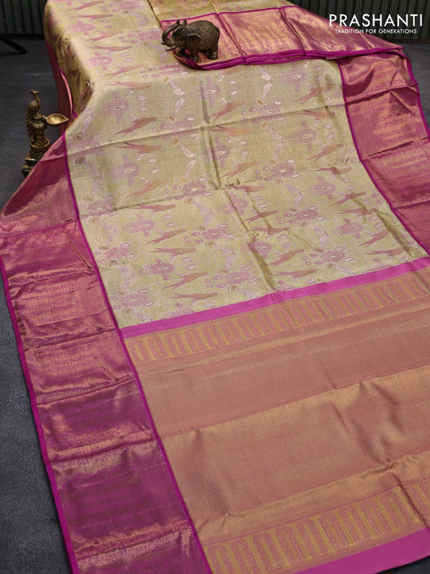 Pure kanjivaram tissue silk saree elaichi green and pink with allover zari woven parrot designbrocade weaves and long zari woven korvai border