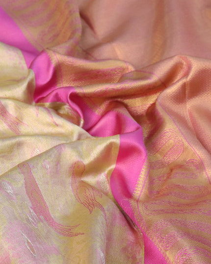 Pure kanjivaram tissue silk saree elaichi green and pink with allover zari woven parrot designbrocade weaves and long zari woven korvai border