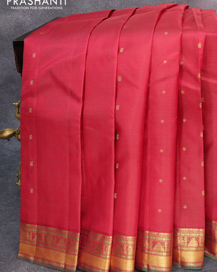 Pure kanjivaram silk saree maroon and dual shade of green with allover zari stripes & buttas and temple & annam zari woven border