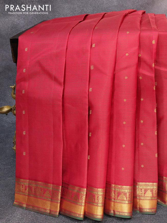 Pure kanjivaram silk saree maroon and dual shade of green with allover zari stripes & buttas and temple & annam zari woven border